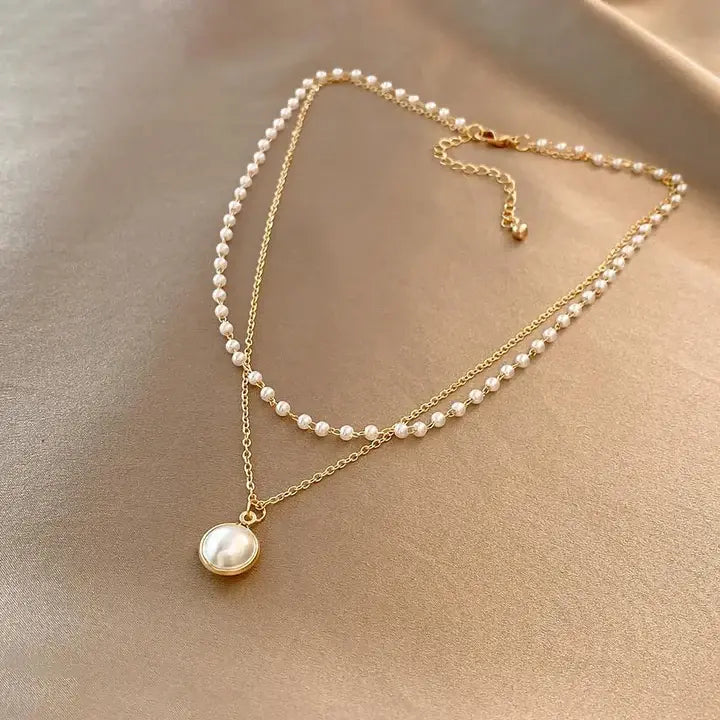 PAOLA | Collier pendentif perle dorée
