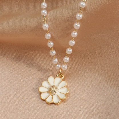 CANDELA | Collier pendentif marguerite et perle