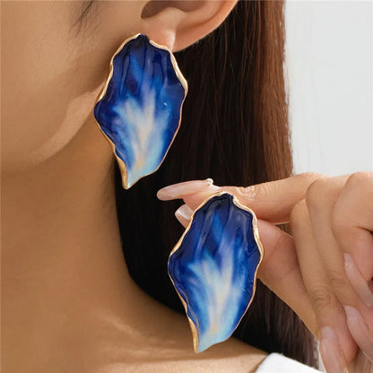 Boucles d'oreilles pendantes en pétales voyantes