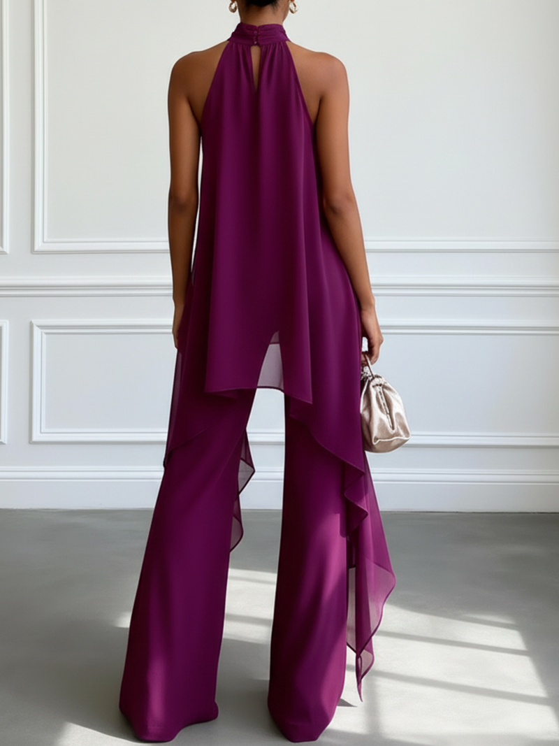 Ensemble deux pièces violet comprenant un haut sans manches à col halter élégant et un pantalon.