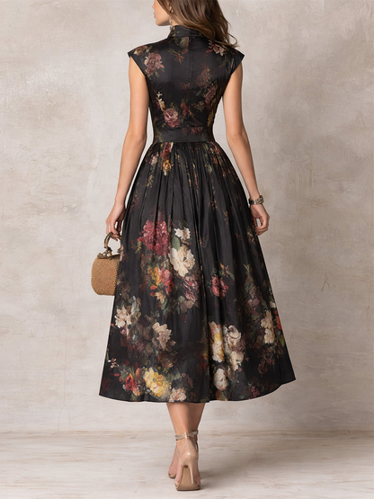 Robe midi en satin noir plissé à col clé et imprimé floral