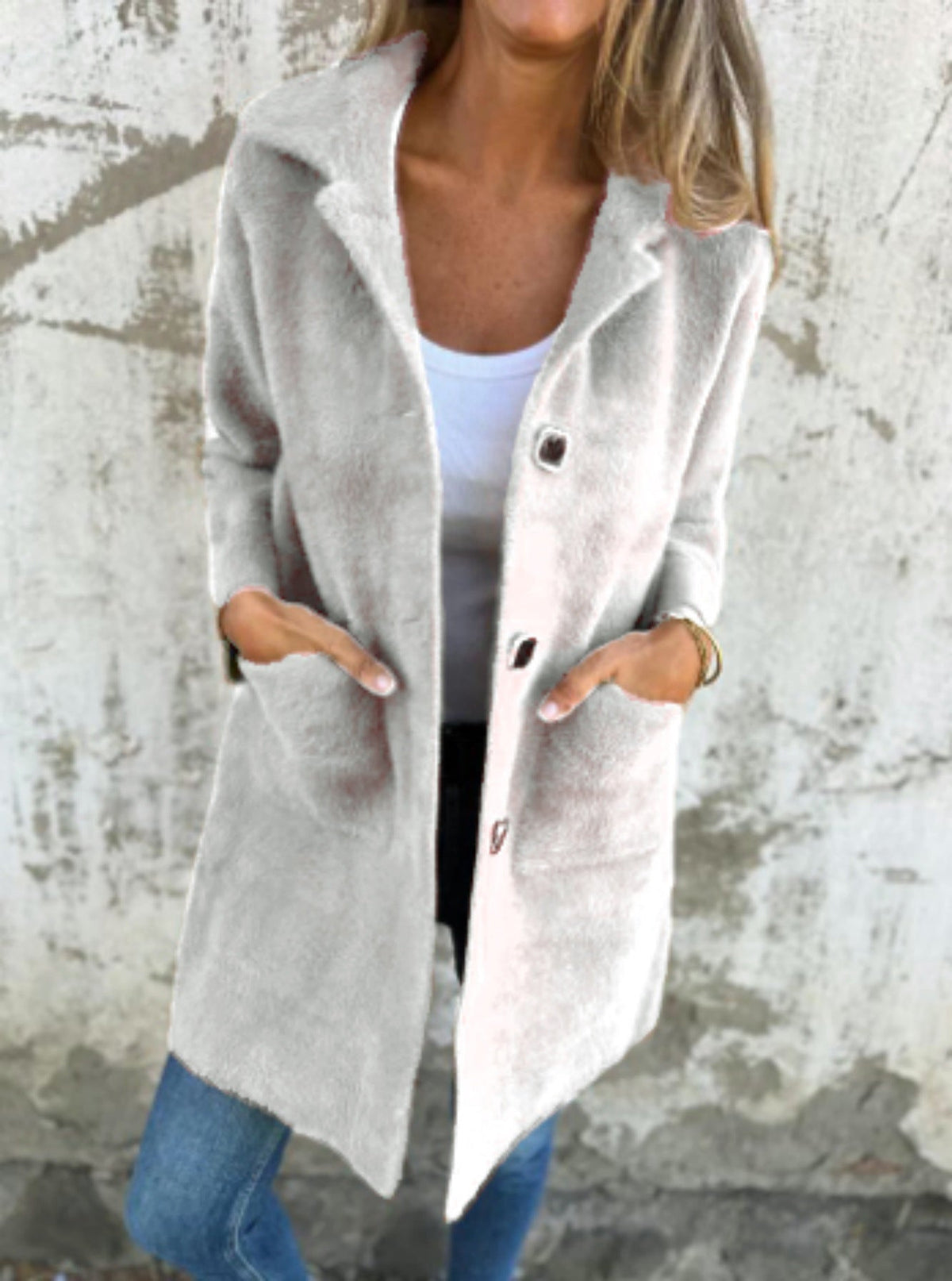 Manteau boutonné à poches et manches longues
